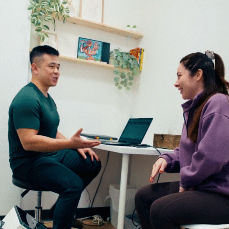 Victoria Chiropractor Rob Hao with patient