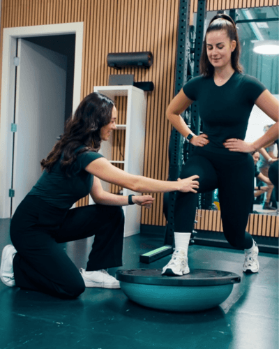 Physiotherapist Sara Keating evaluating biomechanics during running assessment